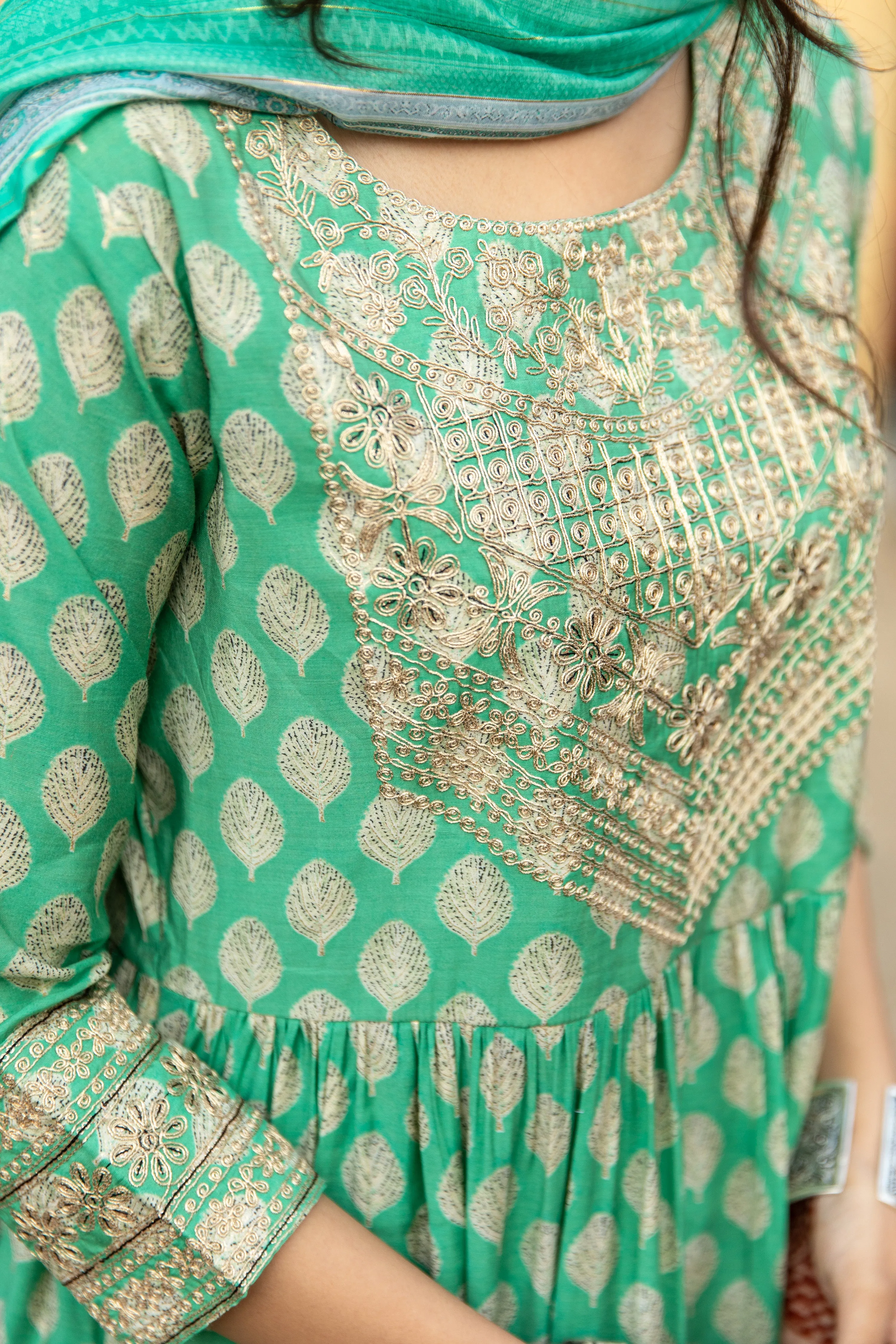 Women Green Muslin Nyara Cut A-Line Kurta Trouser Dupatta & Fancy Potli Set